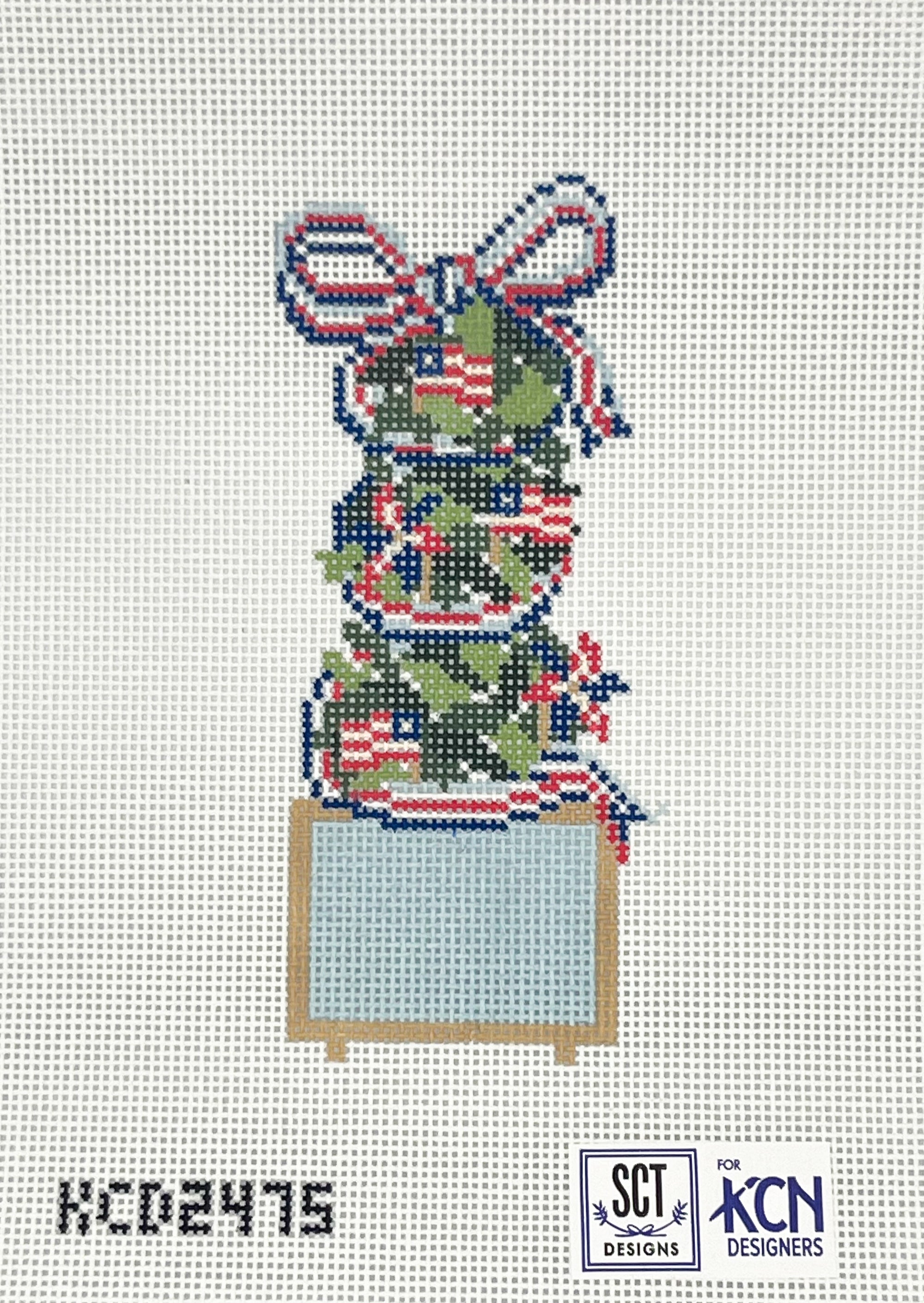 Green boxwood needlepoint design with American flags and light blue planter on a white canvas