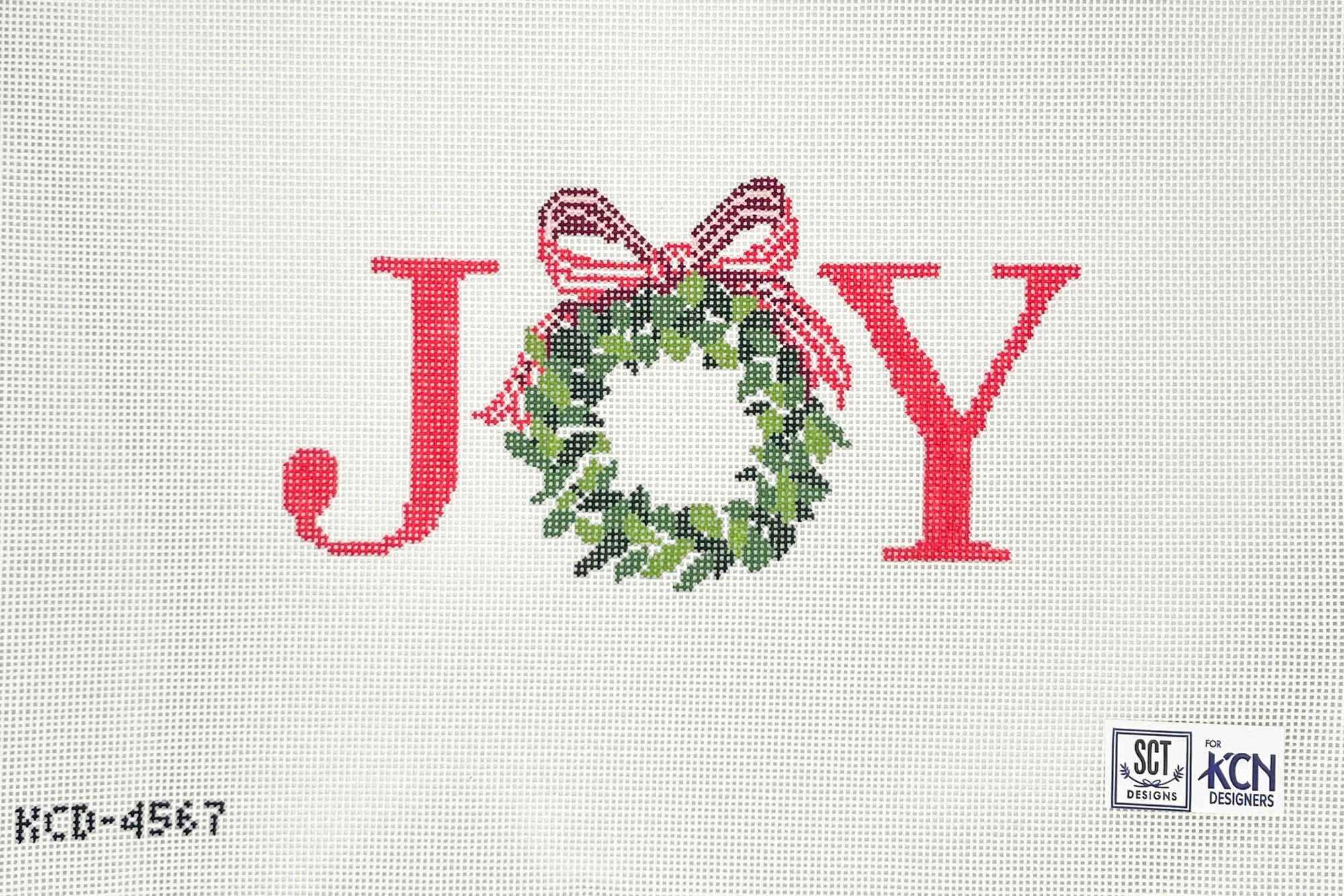 Red JOY needlepoint canvas with a green wreath on a white canvas background