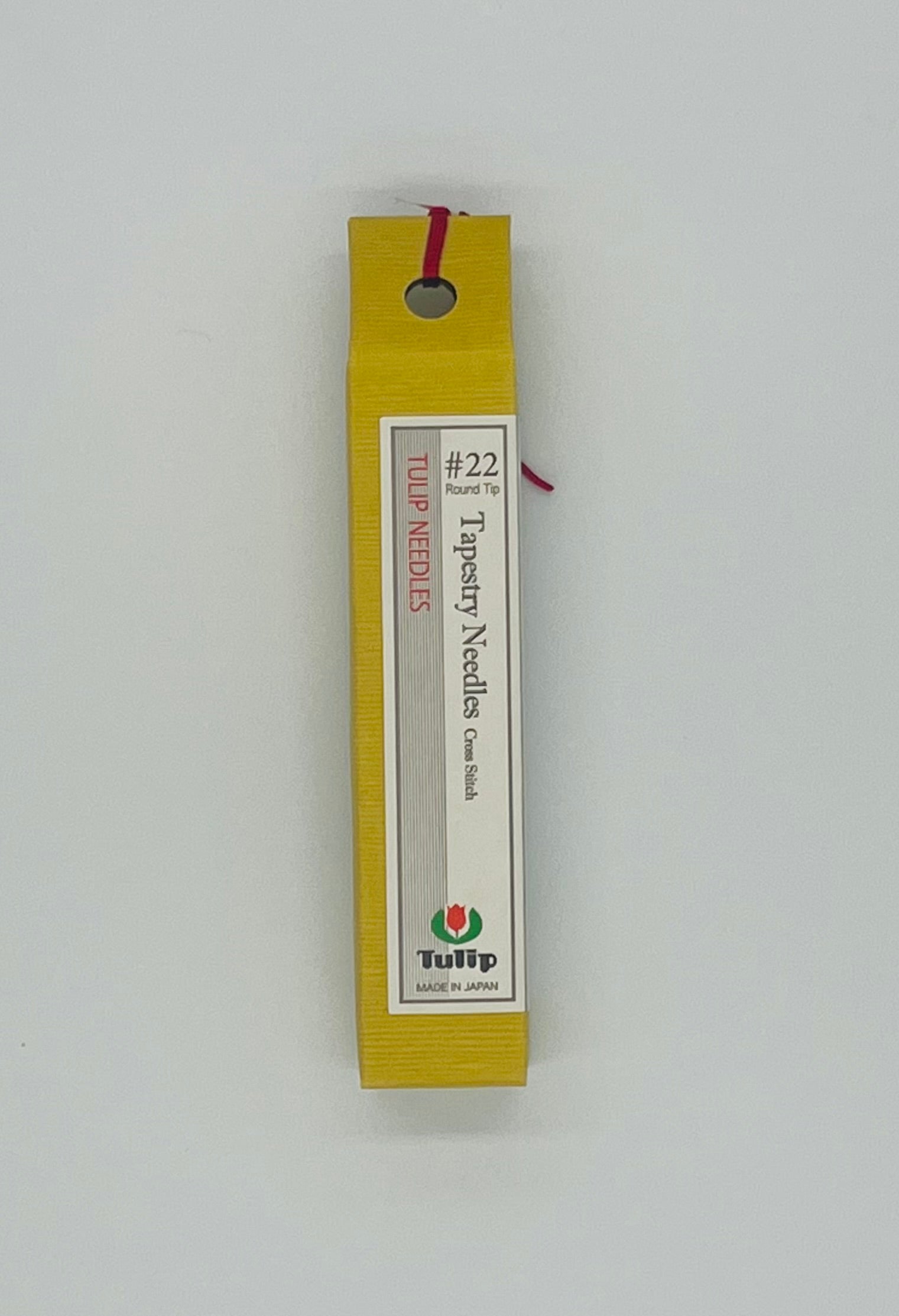 Box of Tulip needles with a white label on a light gray background